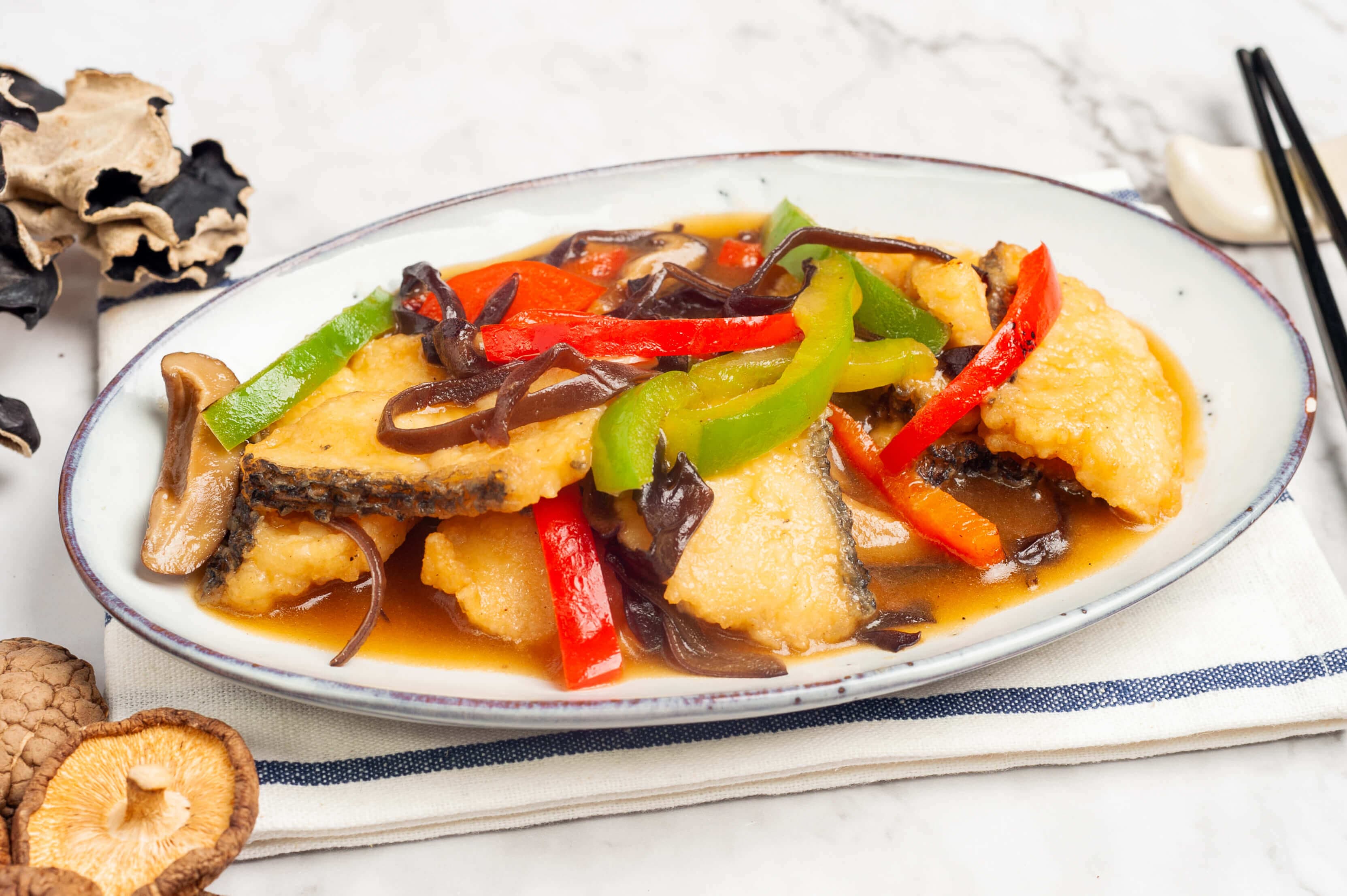 Stir-fried fish with capsicum, black fungus and mushroom