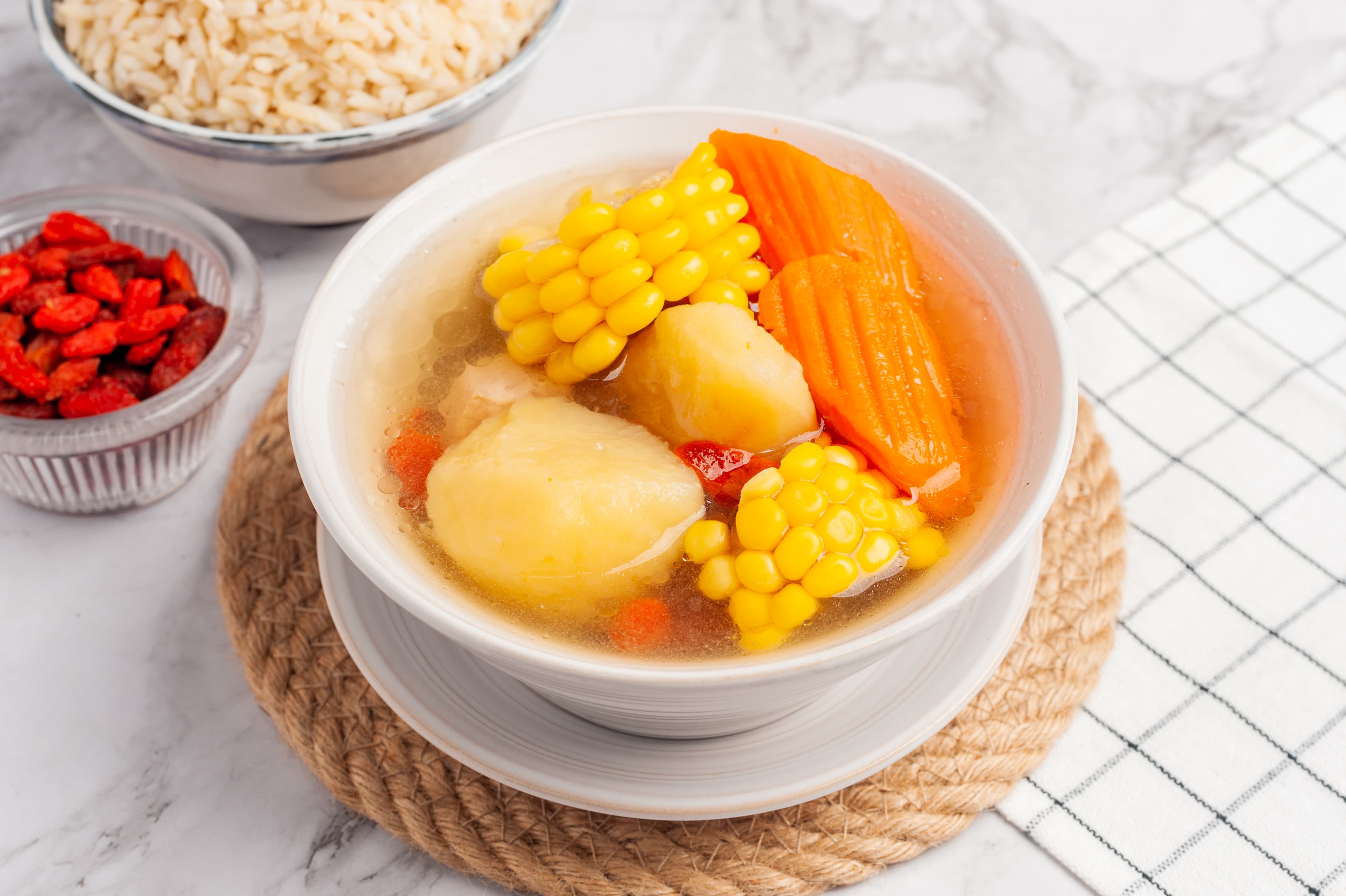 Carrot, potato and corn soup