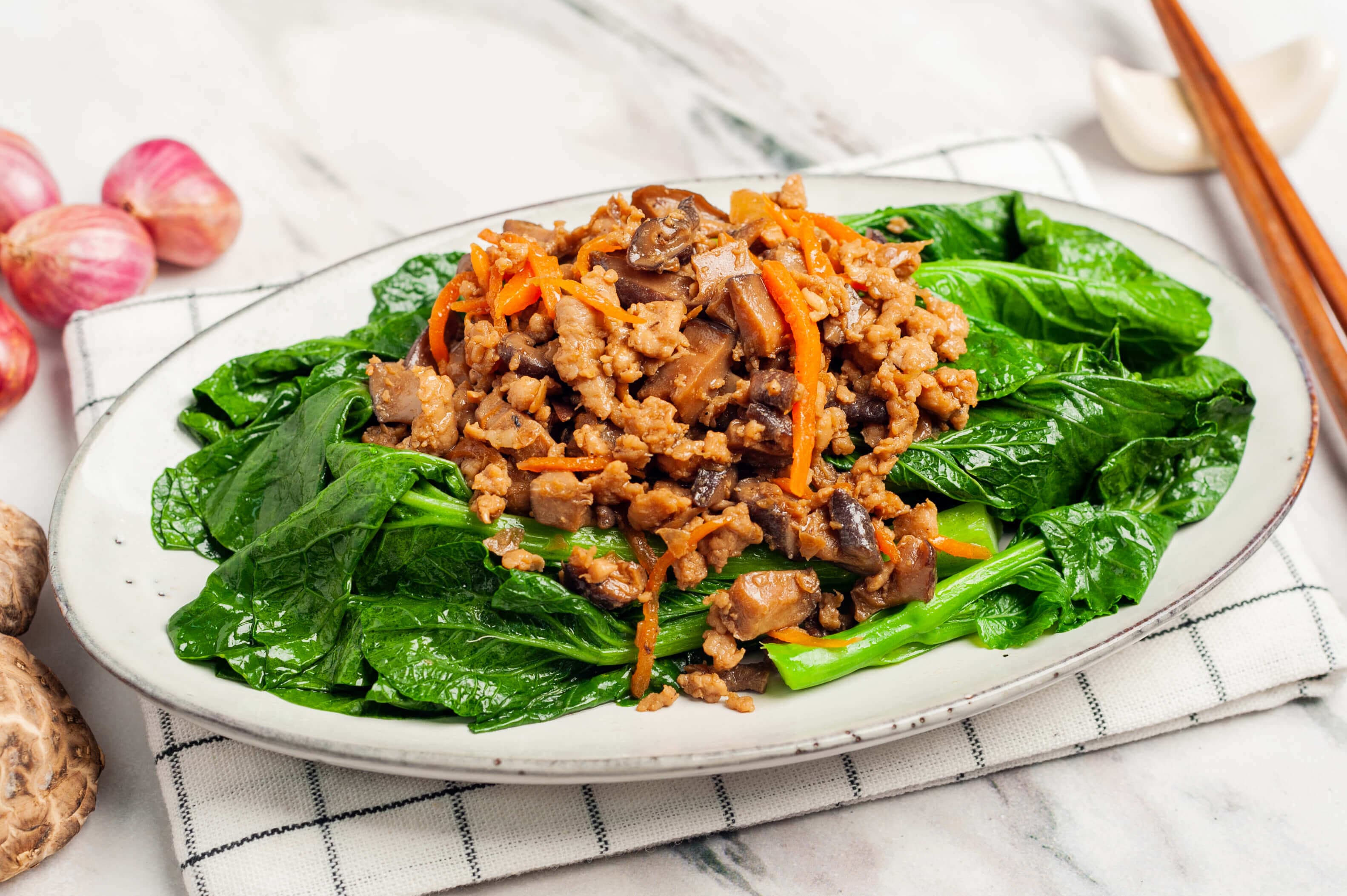 Blanched choy sum with minced pork and shiitake mushrooms