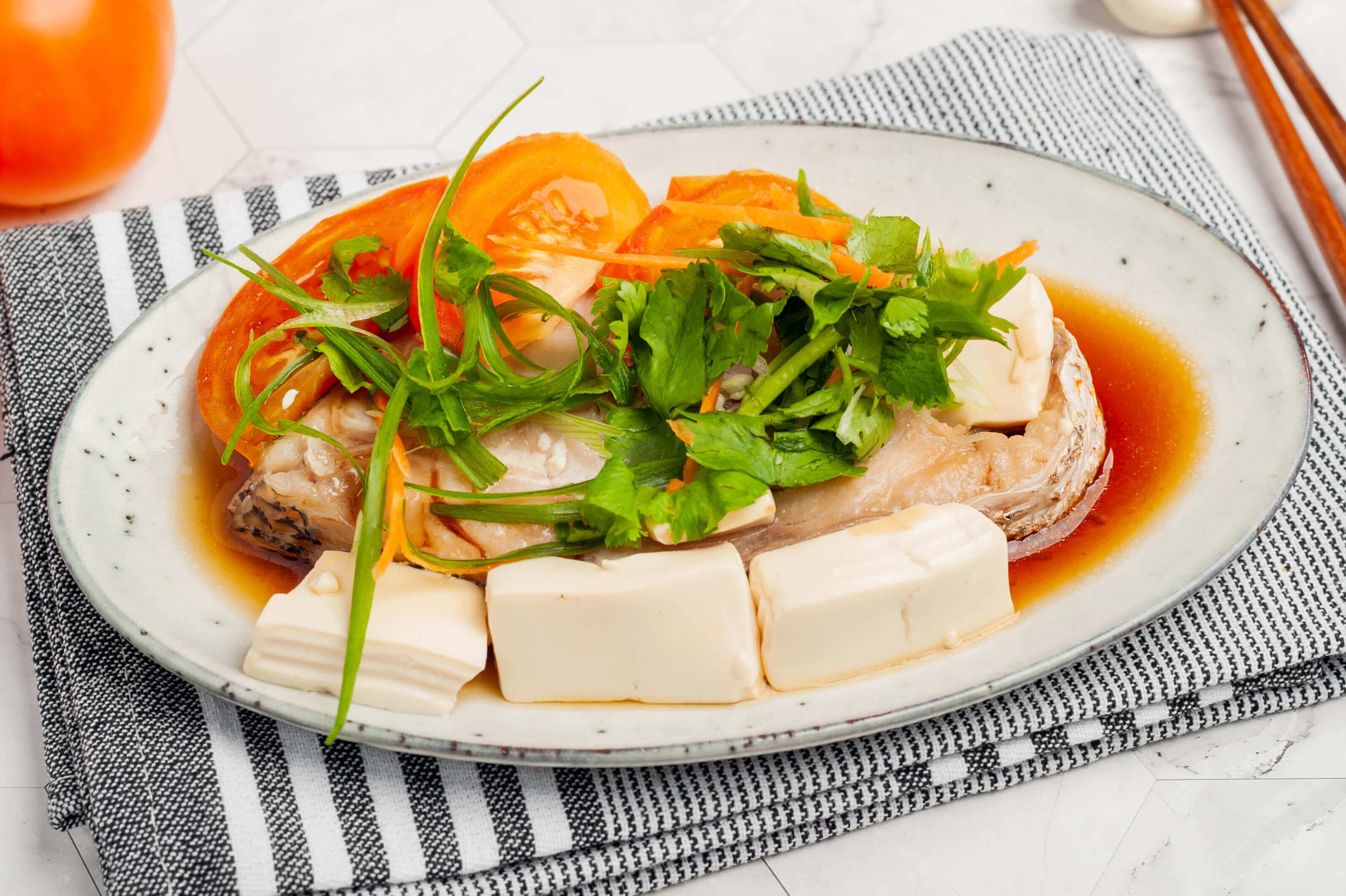 Steamed fish with tomato and tofu